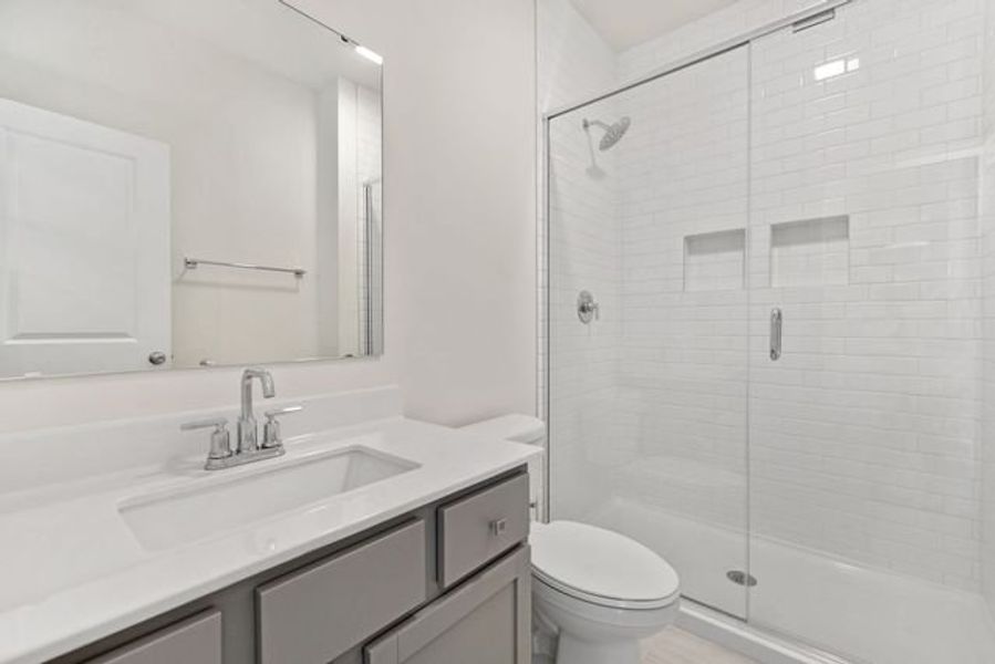 Representative furnished interior of a home built from the Shaw by True Homes in Whispering Hills, Locust (Image 9).