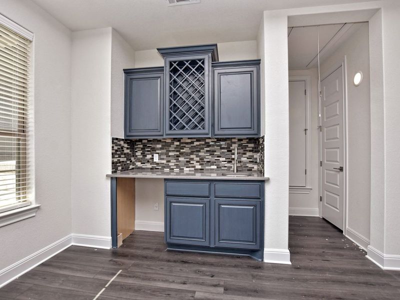 Representative furnished interior of a home built from the Game Room by Giddens Homes in Whispering Wind, Bertram (Image 7).