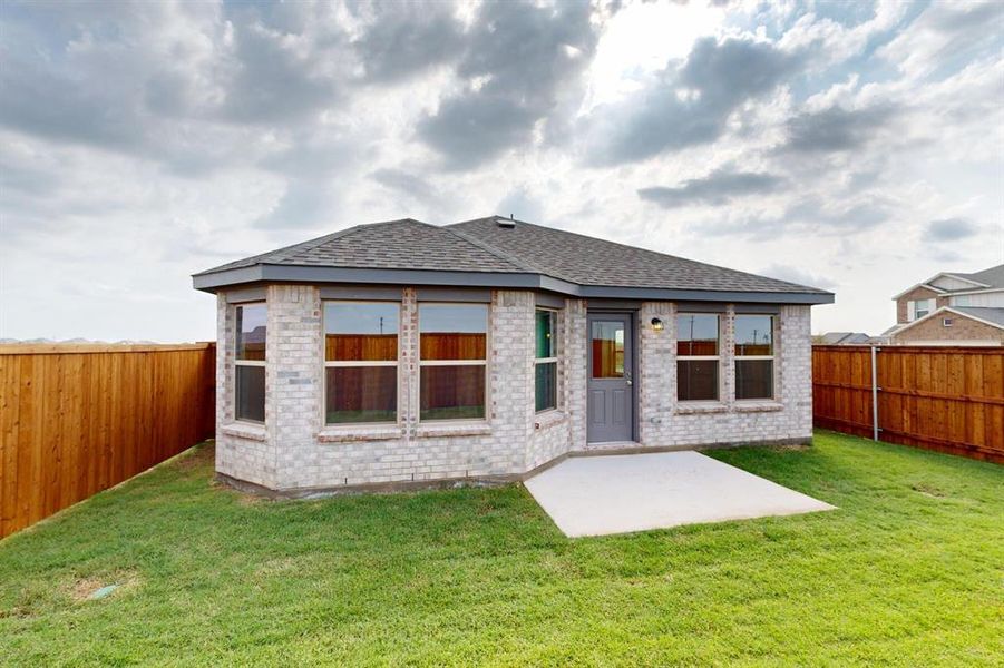 Exterior details and patio area of a home in Mobberly Farms, Pilot Point (Image 4). Exterior details and patio area of a home in Mobberly Farms, Pilot Point (Image 4).