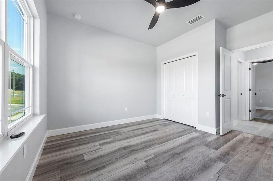 Spacious, unfurnished interior of a new home in Grand Oaks, Gainesville (Image 25).