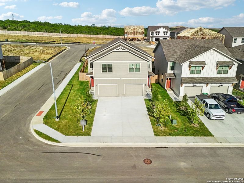 Front exterior of a new home in , San Antonio, TX, highlighting curb appeal (Image 1).
