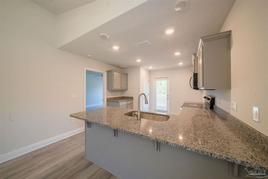 Furnished interior view inside a new home in Turtle Creek, Cantonment (Image 4).