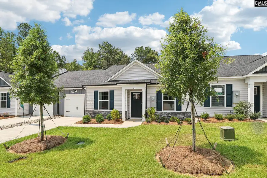 Front exterior of a new home in Piney Woods Bluff, Columbia, SC, highlighting curb appeal (Image 2). Front exterior of a new home in Piney Woods Bluff, Columbia, SC, highlighting curb appeal (Image 2).