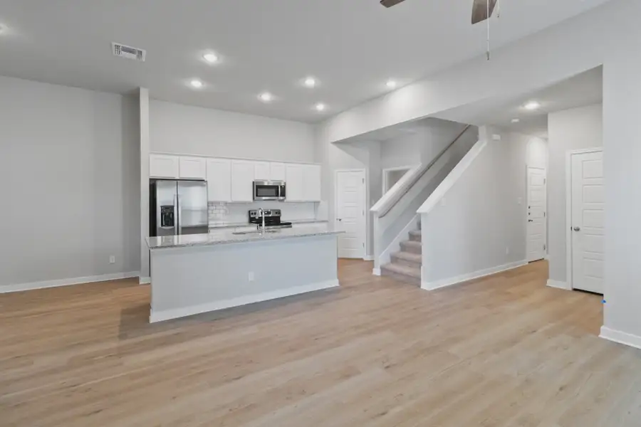 Representative furnished interior of a home built from the Duplex 1676 by TwoTen Communities in Amanda Park, San Antonio (Image 10).