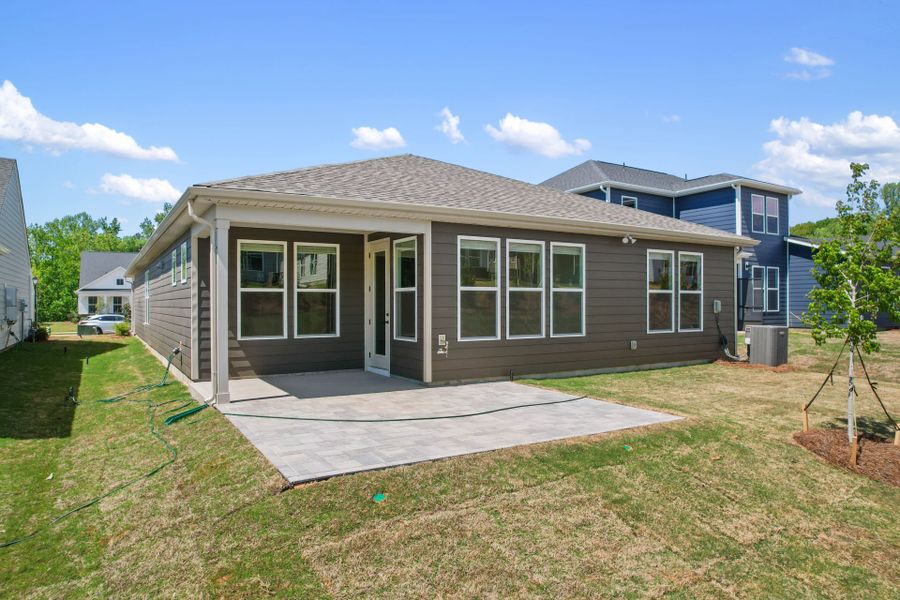 Exterior details and patio area of a home in Carolina Riverside, Belmont (Image 27).