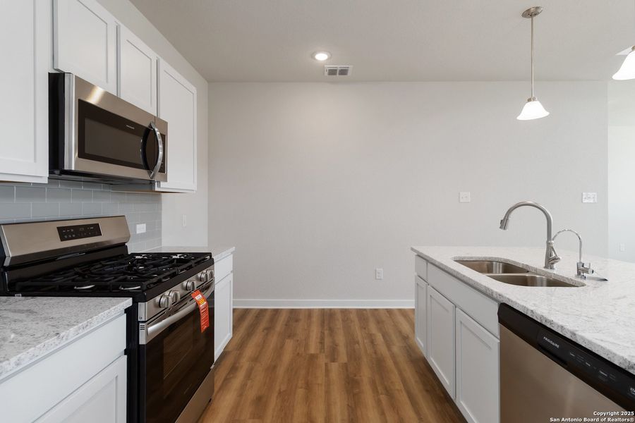 Furnished interior view inside a new home in Hickory Ridge, Elmendorf (Image 4).