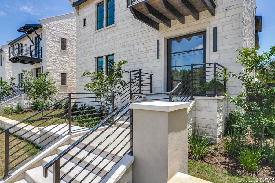 Front exterior of a new home in , Boerne, TX, highlighting curb appeal (Image 22). Front exterior of a new home in , Boerne, TX, highlighting curb appeal (Image 22).