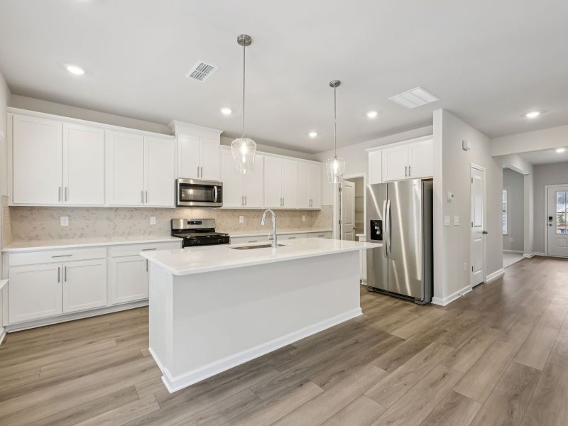 Furnished interior view inside a new home in Northwoods at Mirror Lake, Villa Rica (Image 5).