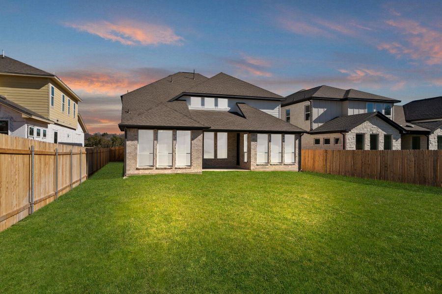 Rear of Home and Private Backyard