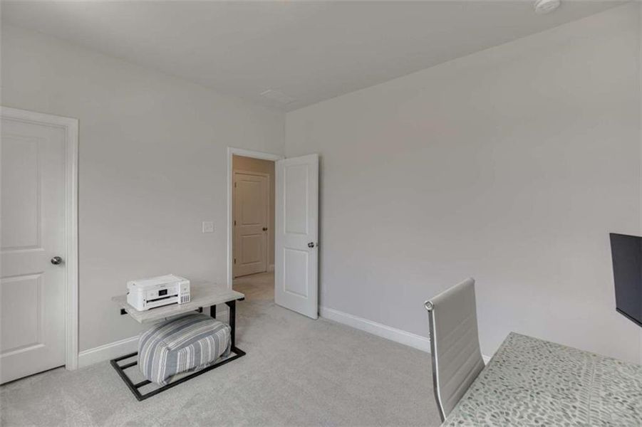 Furnished interior view inside a new home in Overlook at Lanier, Buford (Image 40).