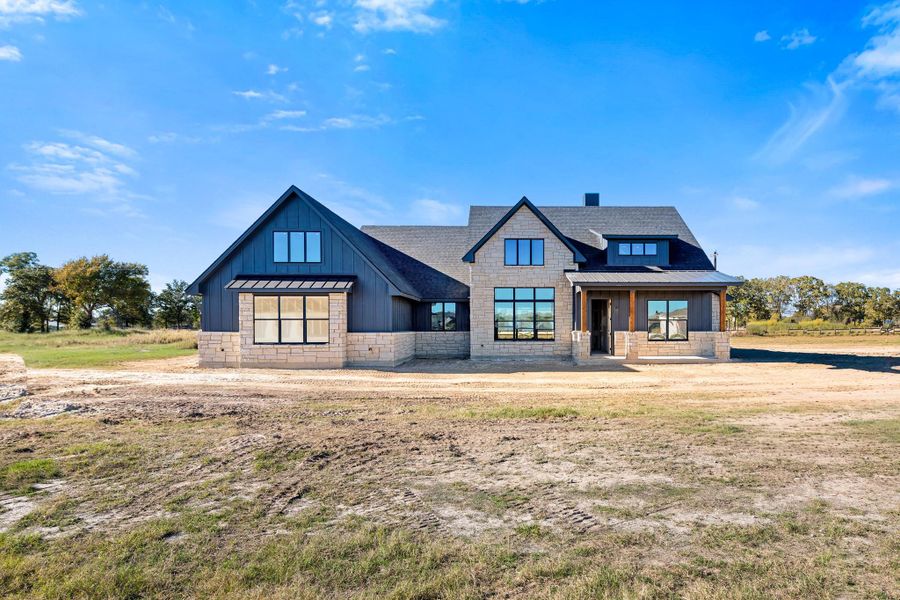 Front exterior of a new home in , Bryan, TX, highlighting curb appeal (Image 2). Front exterior of a new home in , Bryan, TX, highlighting curb appeal (Image 2).