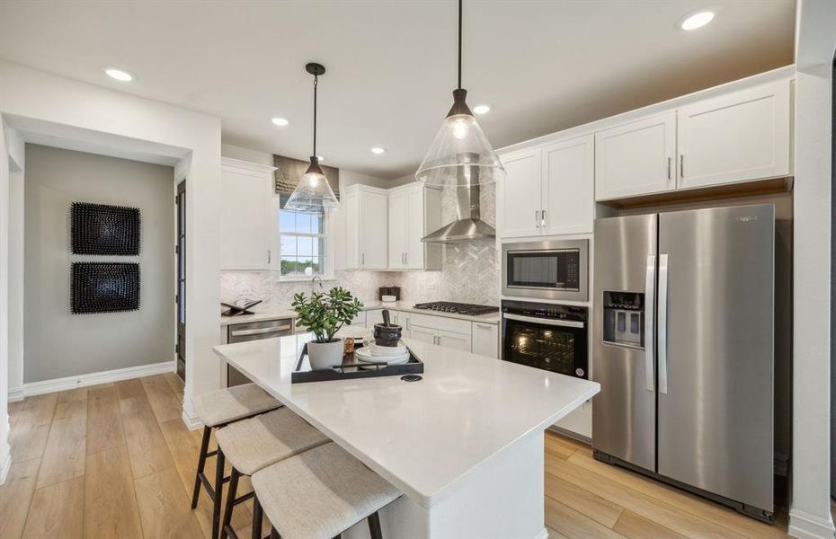 Spacious kitchen with eat-in bartop island Spacious kitchen with eat-in bartop island