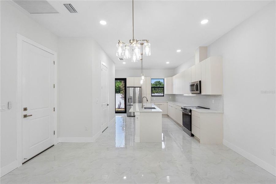 Furnished interior view inside a new home in , Tampa (Image 11).