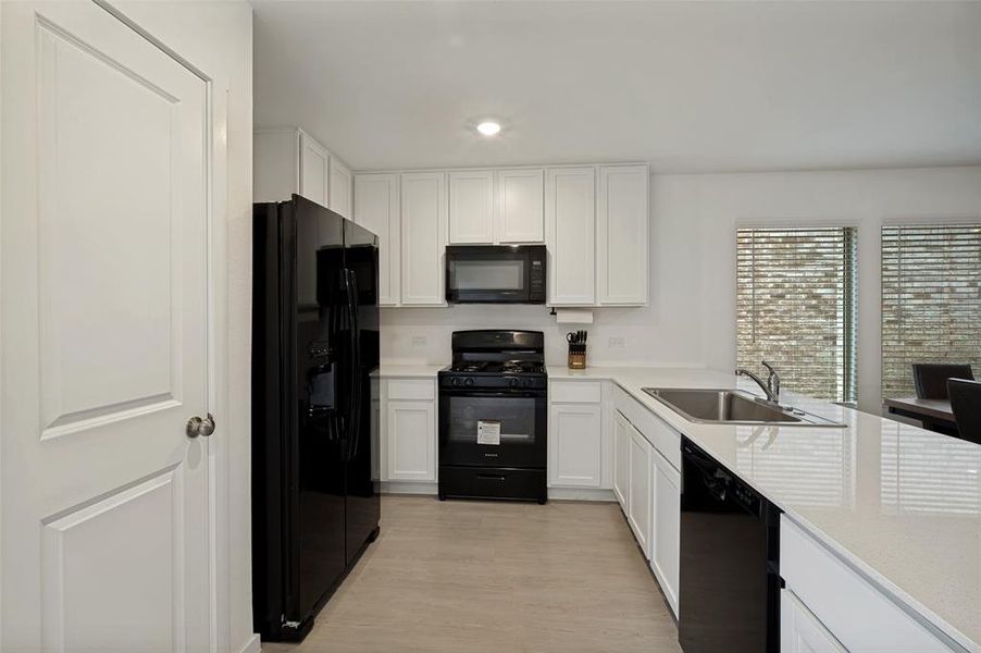 Furnished interior view inside a new home in , Little Elm (Image 10).