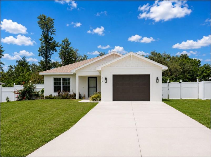 Front exterior of a new home in , Lake Wales, FL, highlighting curb appeal (Image 2). Front exterior of a new home in , Lake Wales, FL, highlighting curb appeal (Image 2).