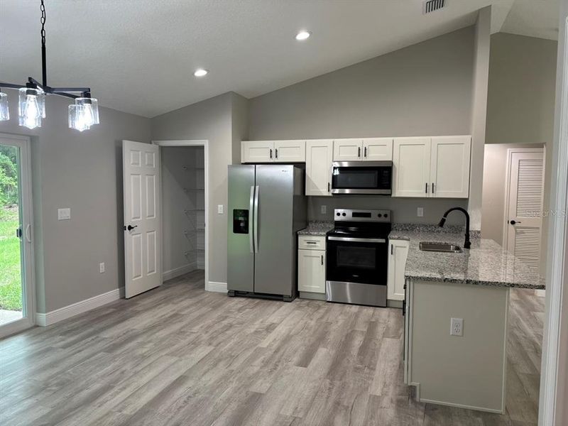 Furnished interior view inside a new home in , Dunnellon (Image 7).