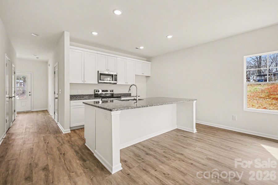 Furnished interior view inside a new home in , Statesville (Image 8).