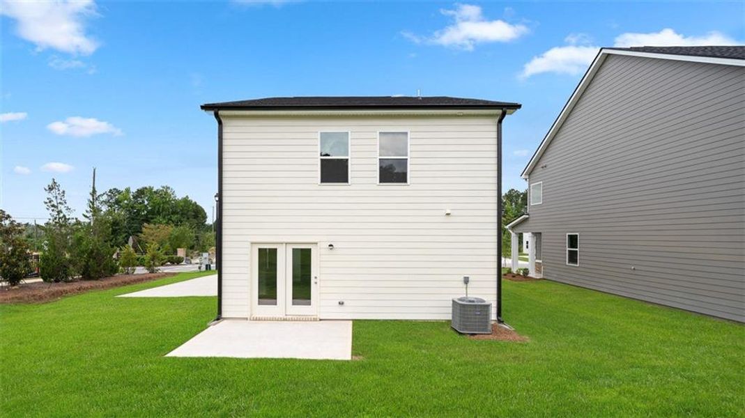Exterior details and patio area of a home in Oakchase at Hampton, Hampton (Image 2).