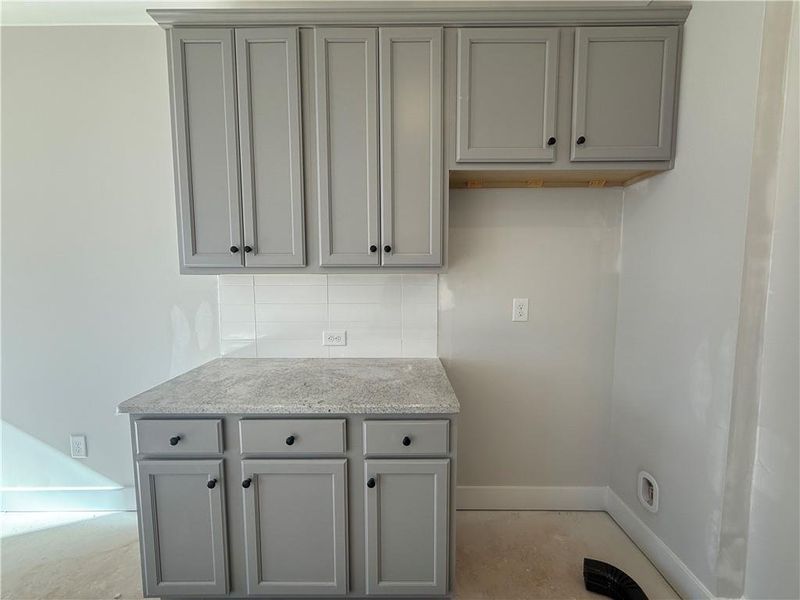 In-progress construction of a new home in The Towns at Auburn Station East, Auburn, GA (Image 11).