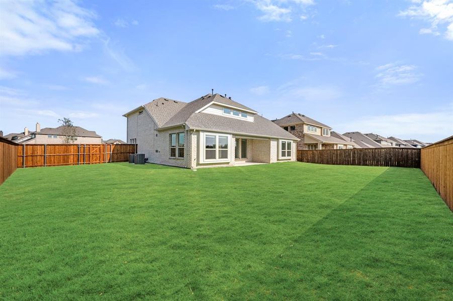 Exterior details and patio area of a home in Terracina, Rockwall (Image 3). Exterior details and patio area of a home in Terracina, Rockwall (Image 3).
