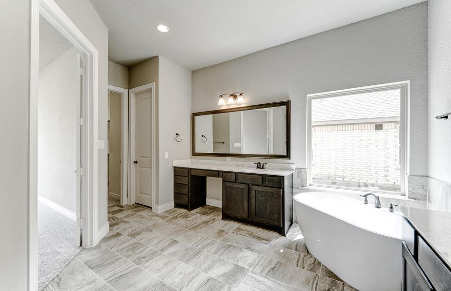 Furnished interior view inside a new home in Bridgeland 60′, Cypress (Image 7).