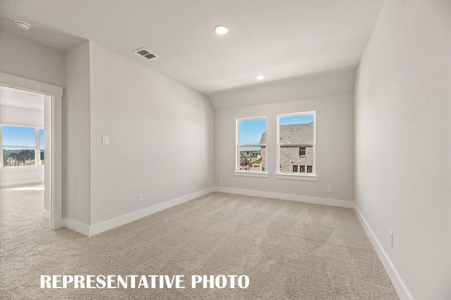 Upstairs you are greeted by a lovely loft space which is the perfect second family living area.  REPRESENTATIVE PHOTO