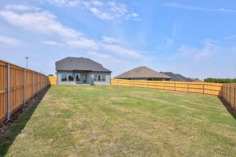 Exterior details and patio area of a home in Prairie Winds, Hutto (Image 28). Exterior details and patio area of a home in Prairie Winds, Hutto (Image 28).