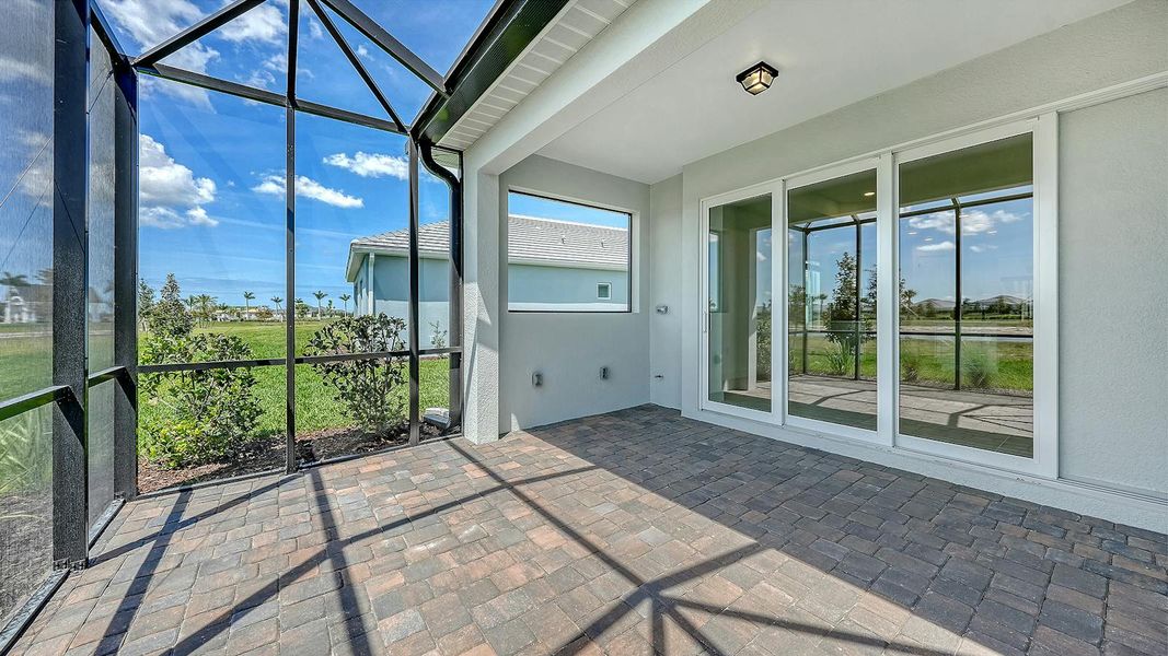 Exterior details and patio area of a home in Palmera Real Estate and Homes for Sale in Venice, FL - Neal Communities, Venice (Image 22). Exterior details and patio area of a home in Palmera Real Estate and Homes for Sale in Venice, FL - Neal Communities, Venice (Image 22).