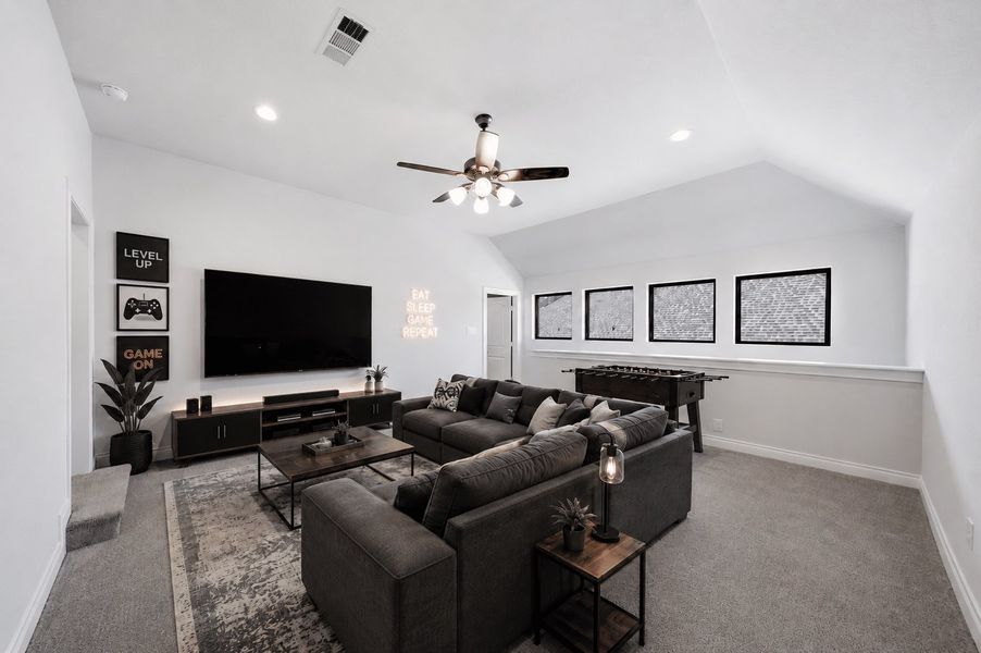 Furnished interior view inside a new home in The Woodlands Hills 65′, Willis (Image 9).