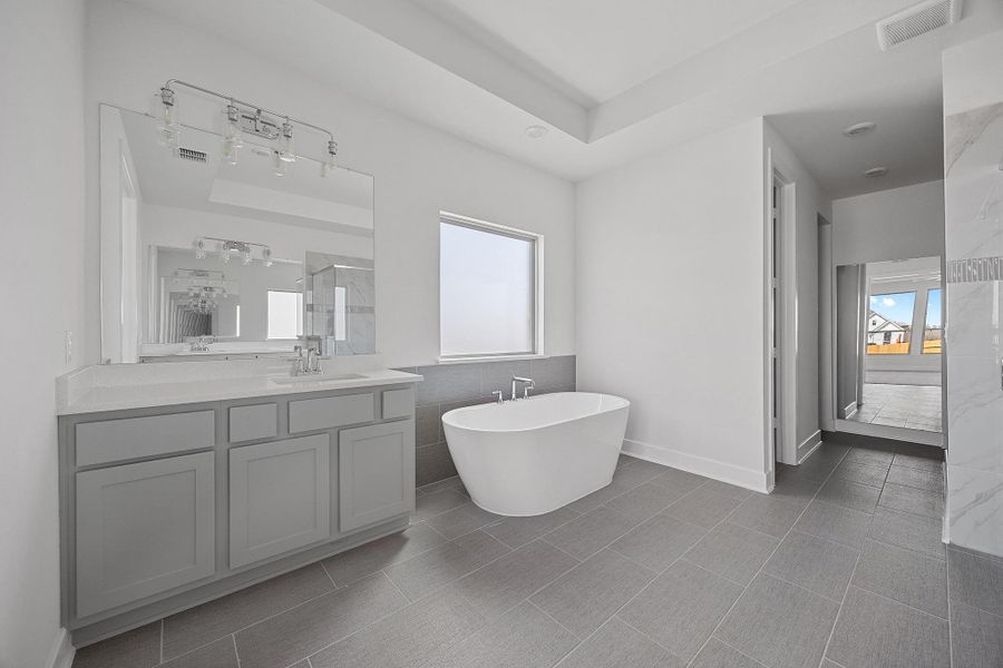 Furnished interior view inside a new home in Flora - 60', Hutto (Image 8).