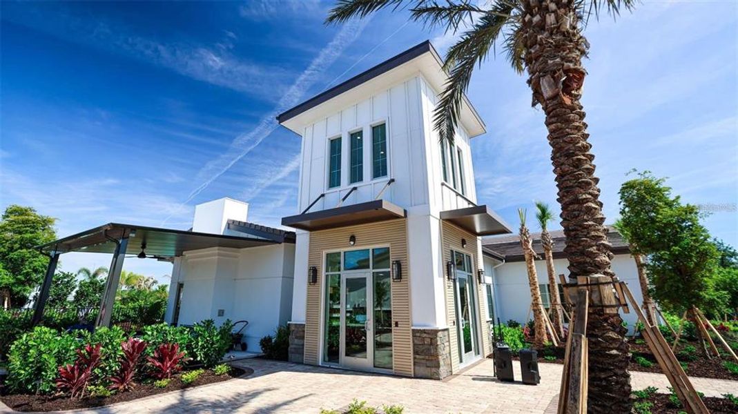 Front exterior of a new home in Star Farms at Lakewood Ranch, Lakewood Ranch, FL, highlighting curb appeal (Image 1). Front exterior of a new home in Star Farms at Lakewood Ranch, Lakewood Ranch, FL, highlighting curb appeal (Image 1).