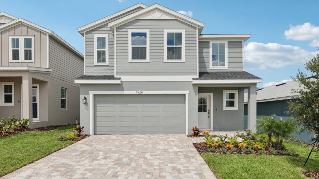 Representative exterior photo of a completed home built from the Naples by DRB Homes in Willowbrook North, Winter Haven, FL (Image 27).