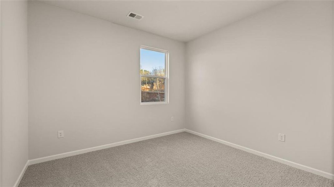 Spacious, unfurnished interior of a new home in Brooks Station, Dacula (Image 22).