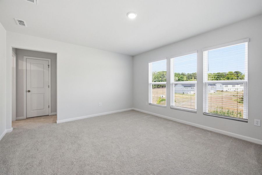 Spacious, unfurnished interior of a new home in Carpenter Falls, Durham (Image 20).