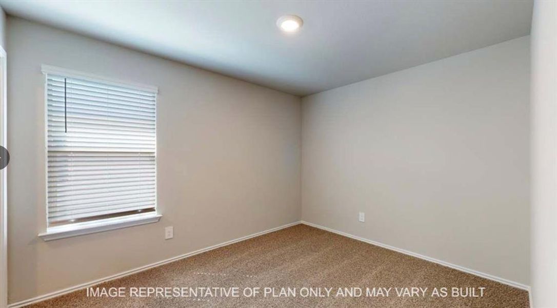Empty room with carpet floors and baseboards