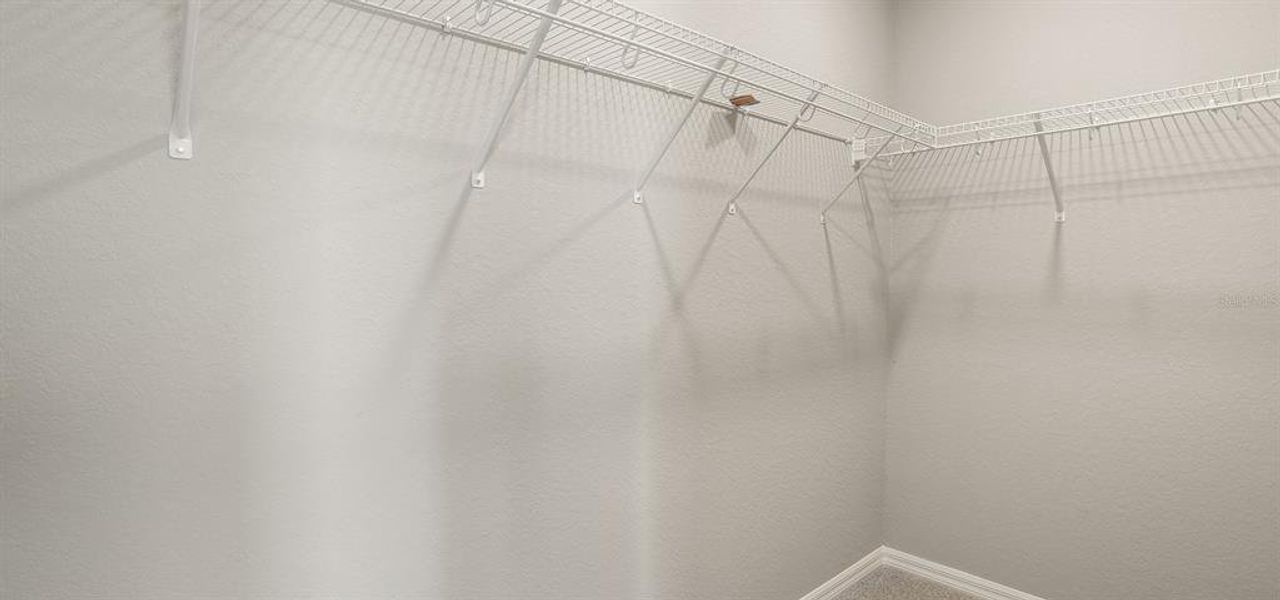 Spacious, unfurnished interior of a new home in Harbor at Lake Henry - Townhomes, Winter Haven (Image 23).