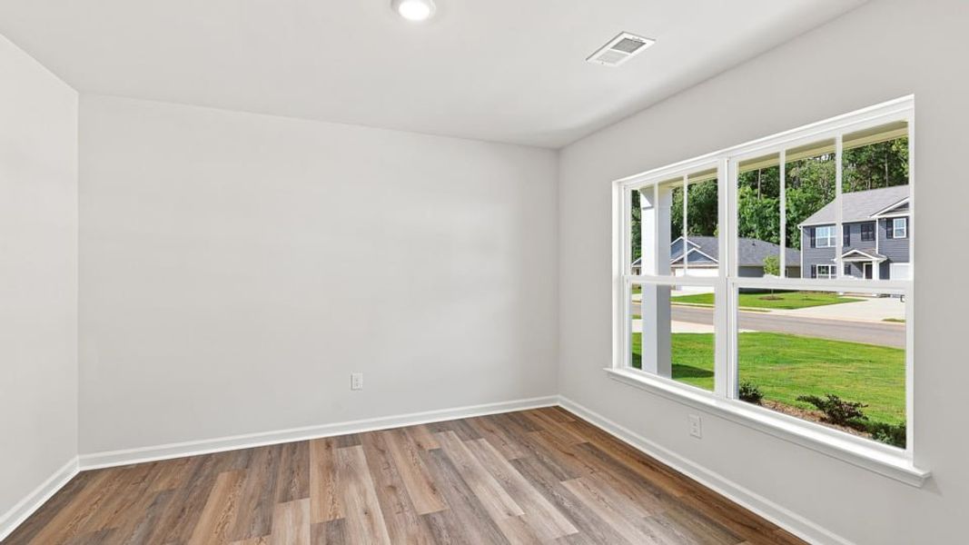 Spacious, unfurnished interior of a new home in Bentley Park, Greenwood (Image 15).
