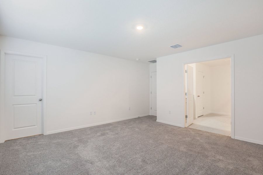 Representative unfurnished interior of a home built from the Springfield by Maronda Homes in Hontoon Reserve, Deland (Image 11).