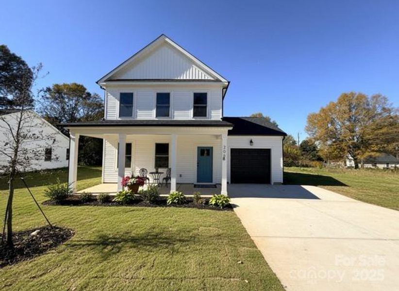 Front exterior of a new home in , Gastonia, NC, highlighting curb appeal (Image 27).