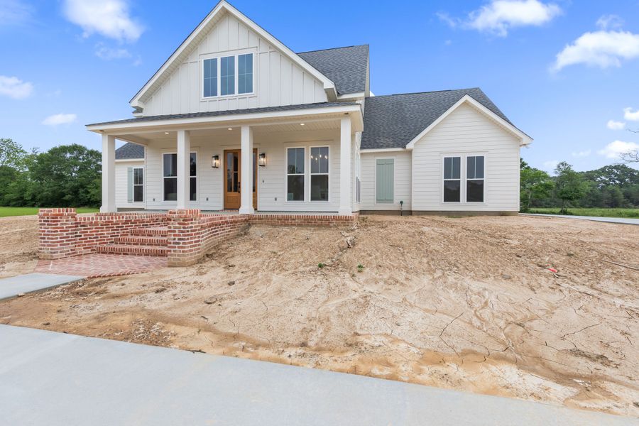 Representative exterior photo of a completed home built from the The Champagne by Manuel Builders in Chapel Bend, Montgomery, TX (Image 2). Representative exterior photo of a completed home built from the The Champagne by Manuel Builders in Chapel Bend, Montgomery, TX (Image 2).