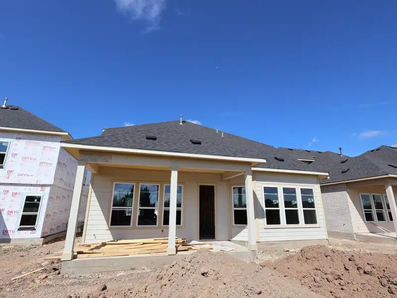 Front exterior of a new home in Barksdale, Leander, TX, highlighting curb appeal (Image 2). Front exterior of a new home in Barksdale, Leander, TX, highlighting curb appeal (Image 2).