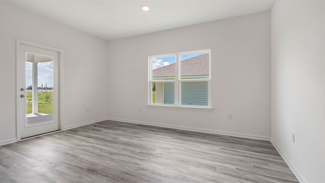 Representative unfurnished interior of a home built from the Aspen by D.R. Horton in Owl's Head East, Freeport (Image 23).