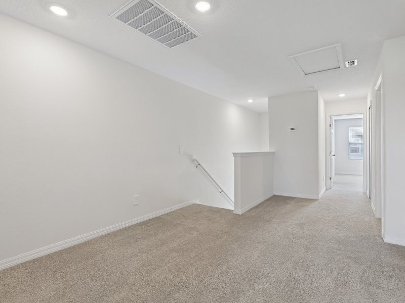 Spacious, unfurnished interior of a new home in The Meadow at Crossprairie Townes, St. Cloud (Image 13).