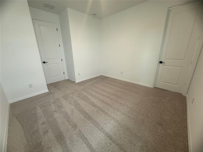 Spacious, unfurnished interior of a new home in Northlake Classical, Winter Garden (Image 31).