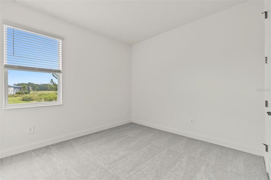 Spacious, unfurnished interior of a new home in Tamarack at Two Rivers, Zephyrhills (Image 17).