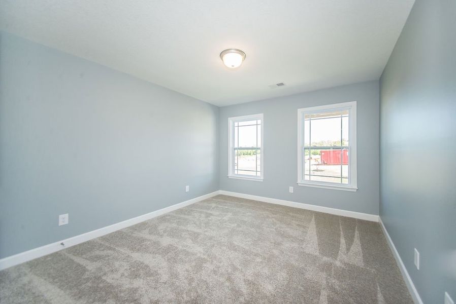 Representative unfurnished interior of a home built from the Jackson by Enchanted Homes in Lonesome Dove, San Antonio (Image 41).