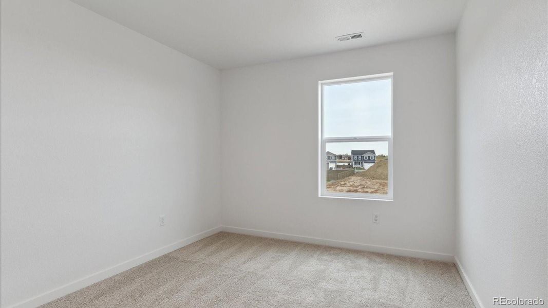 Spacious, unfurnished interior of a new home in Silver Peaks, Lochbuie (Image 16).