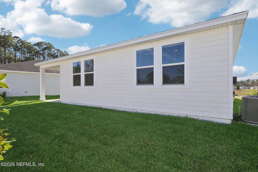 Exterior details and patio area of a home in , Palm Coast (Image 3).