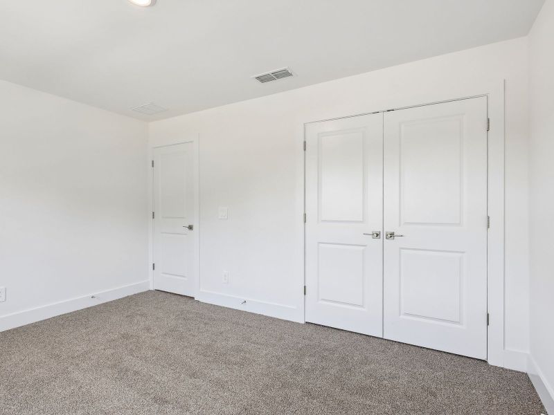 Spacious, unfurnished interior of a new home in Station Hill - Estate Series, Franklin (Image 26). Spacious, unfurnished interior of a new home in Station Hill - Estate Series, Franklin (Image 26).