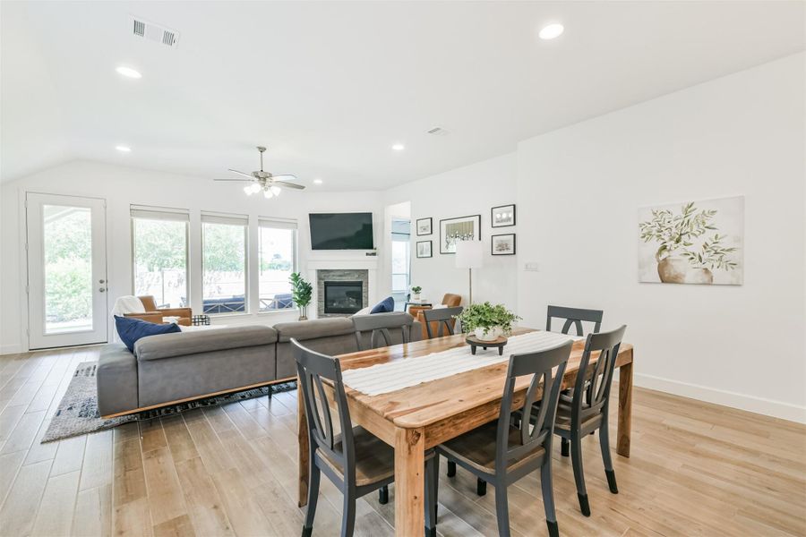 Wood look ceramic tile flows through all the main living areas of this open floorplan. Wood look ceramic tile flows through all the main living areas of this open floorplan.